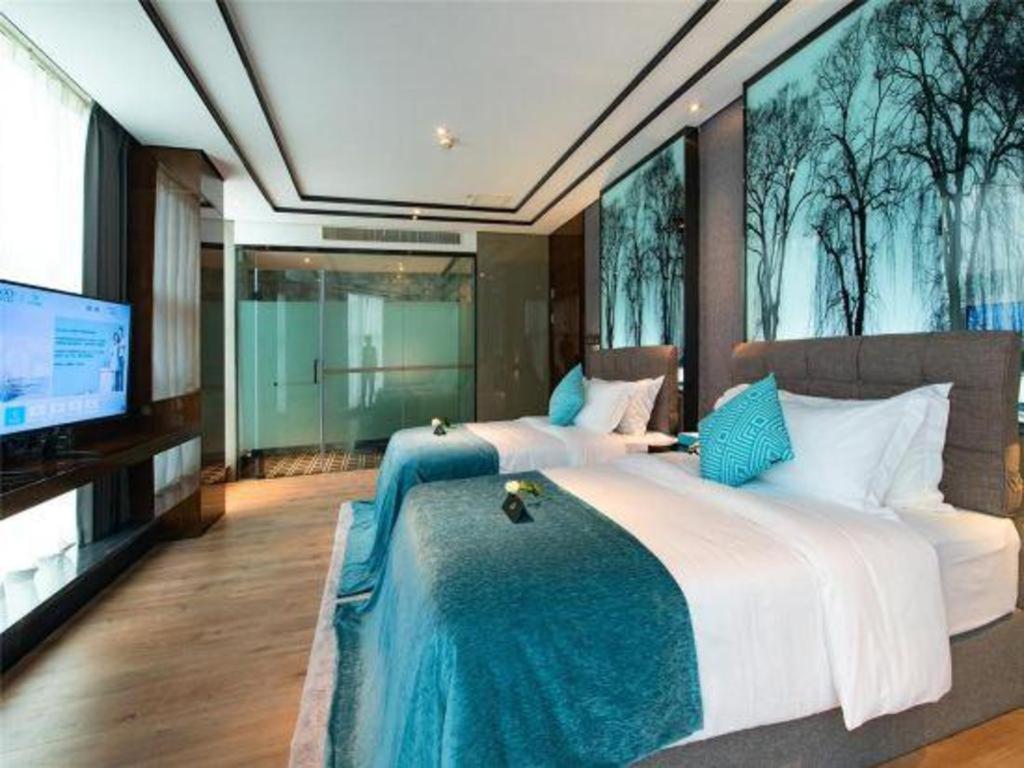 Xana Hotelle-Hotel Luzhou Baizitu Square Eksteriør billede